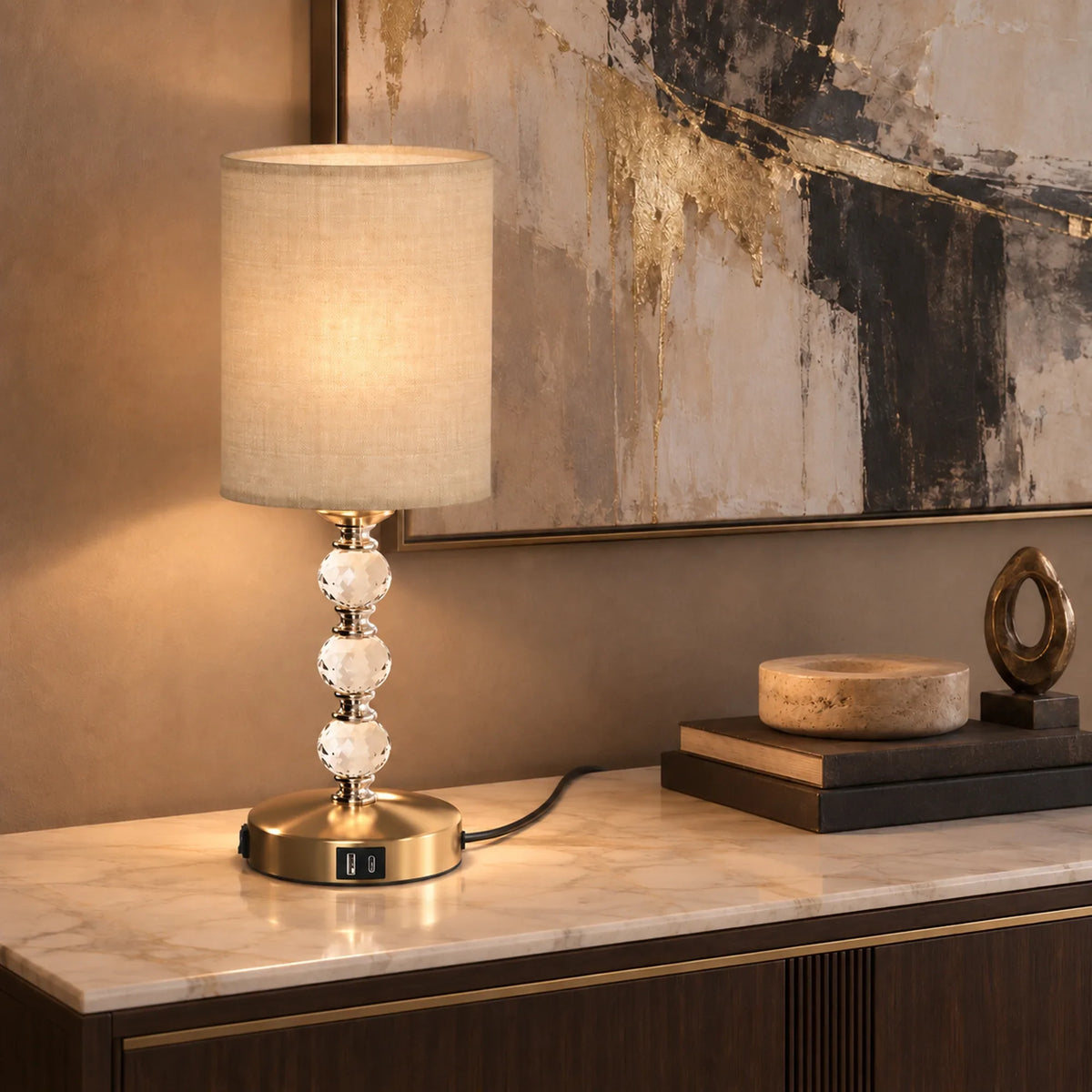 Crystal bedside table lamp with beige fabric shade and gold base