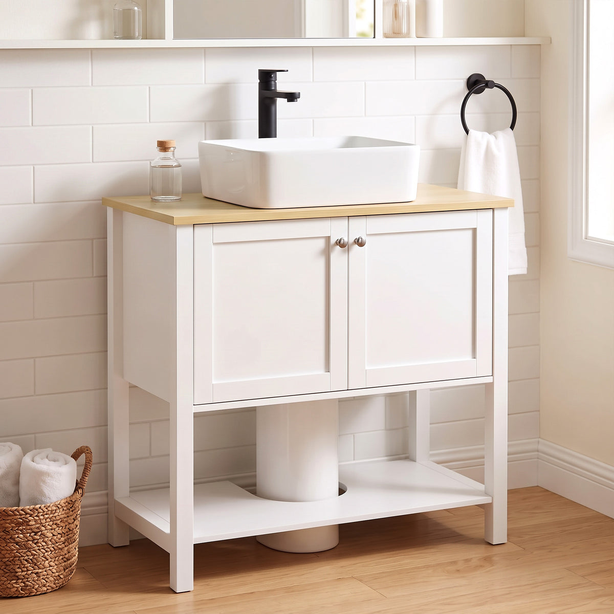 Under-sink cabinet with wood top, two white doors, lower open shelf, bathroom setup.
