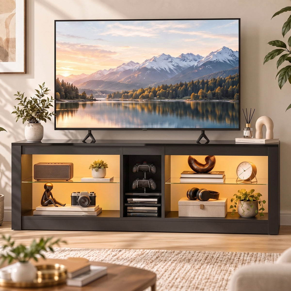 Dark gray TV stand with open storage and LED-style lighting strip along the top