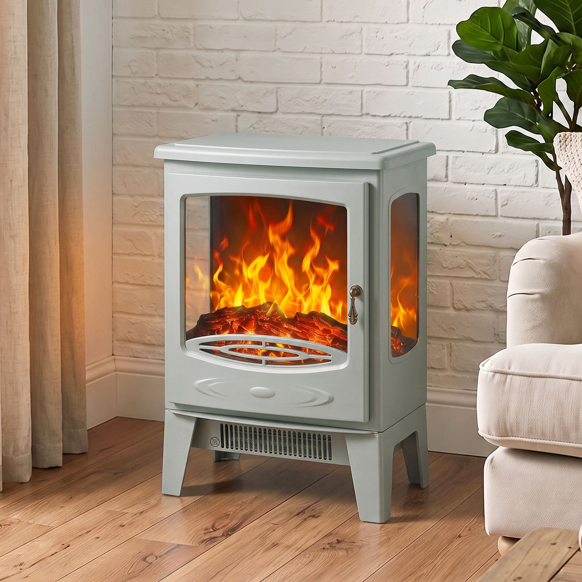 Grey electric fireplace heater with tempered glass front and visible orange LED flames