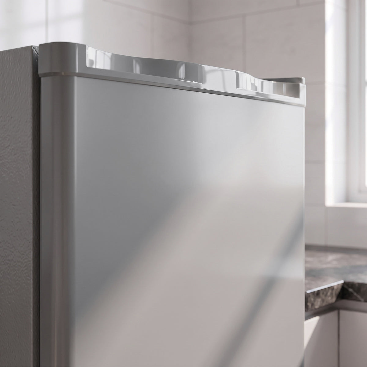 Grey mini freezer door edge with built-in handle