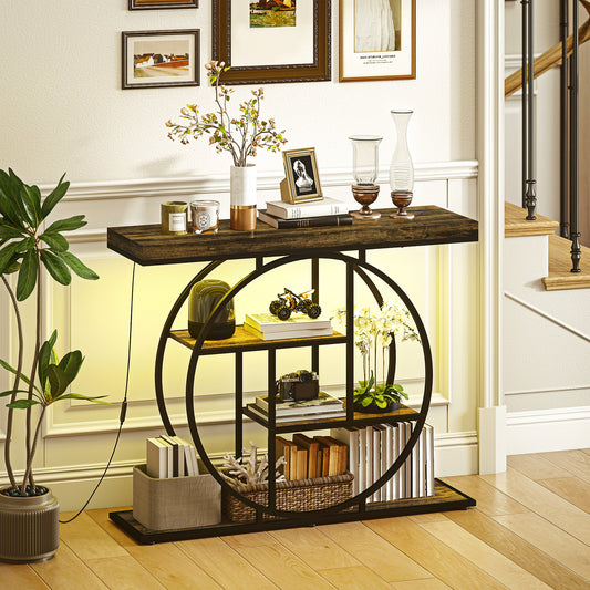 Industrial console table with circular metal frame, dark wood top, open shelves, warm LED glow.
