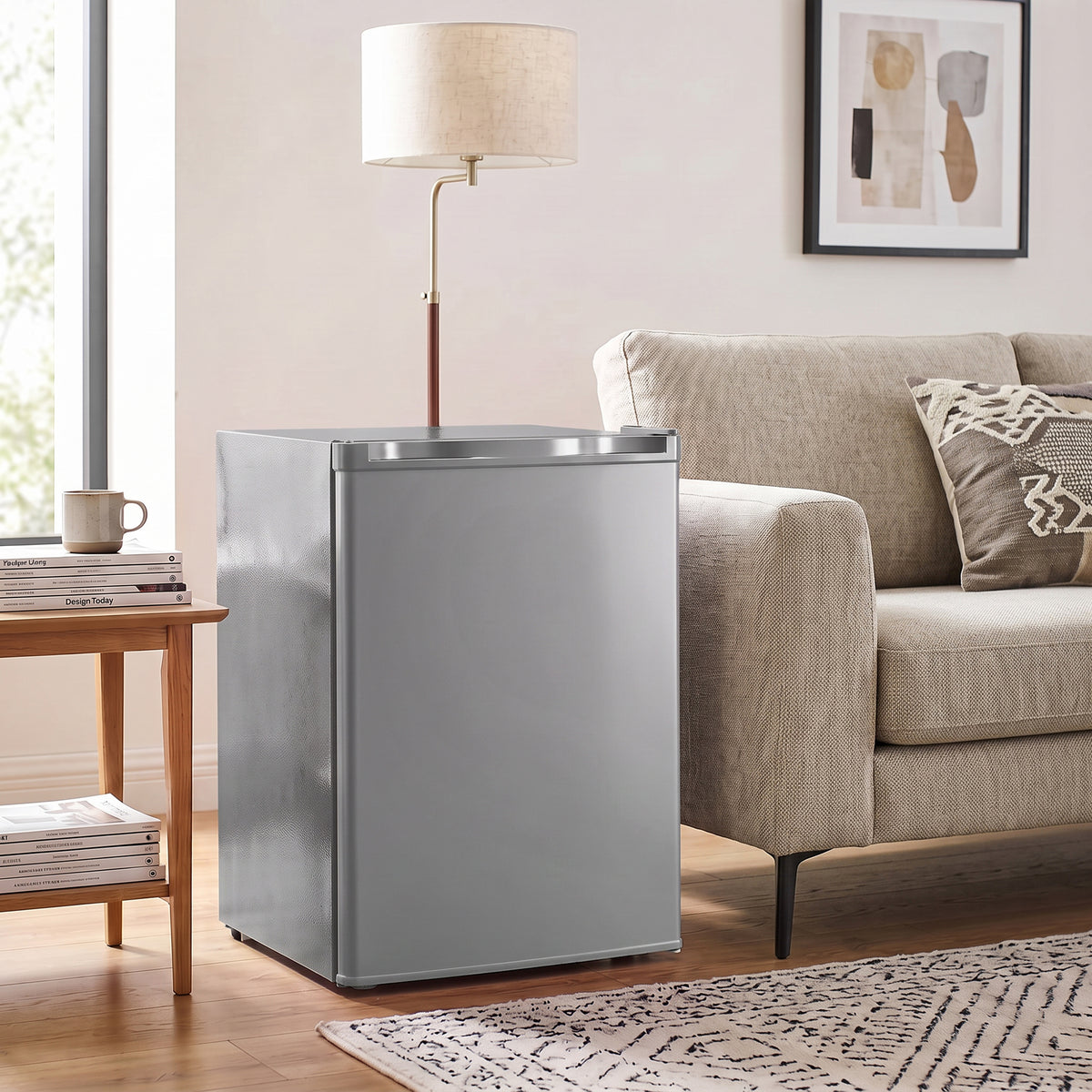 Grey mini fridge with open door showing empty shelves and storage compartments