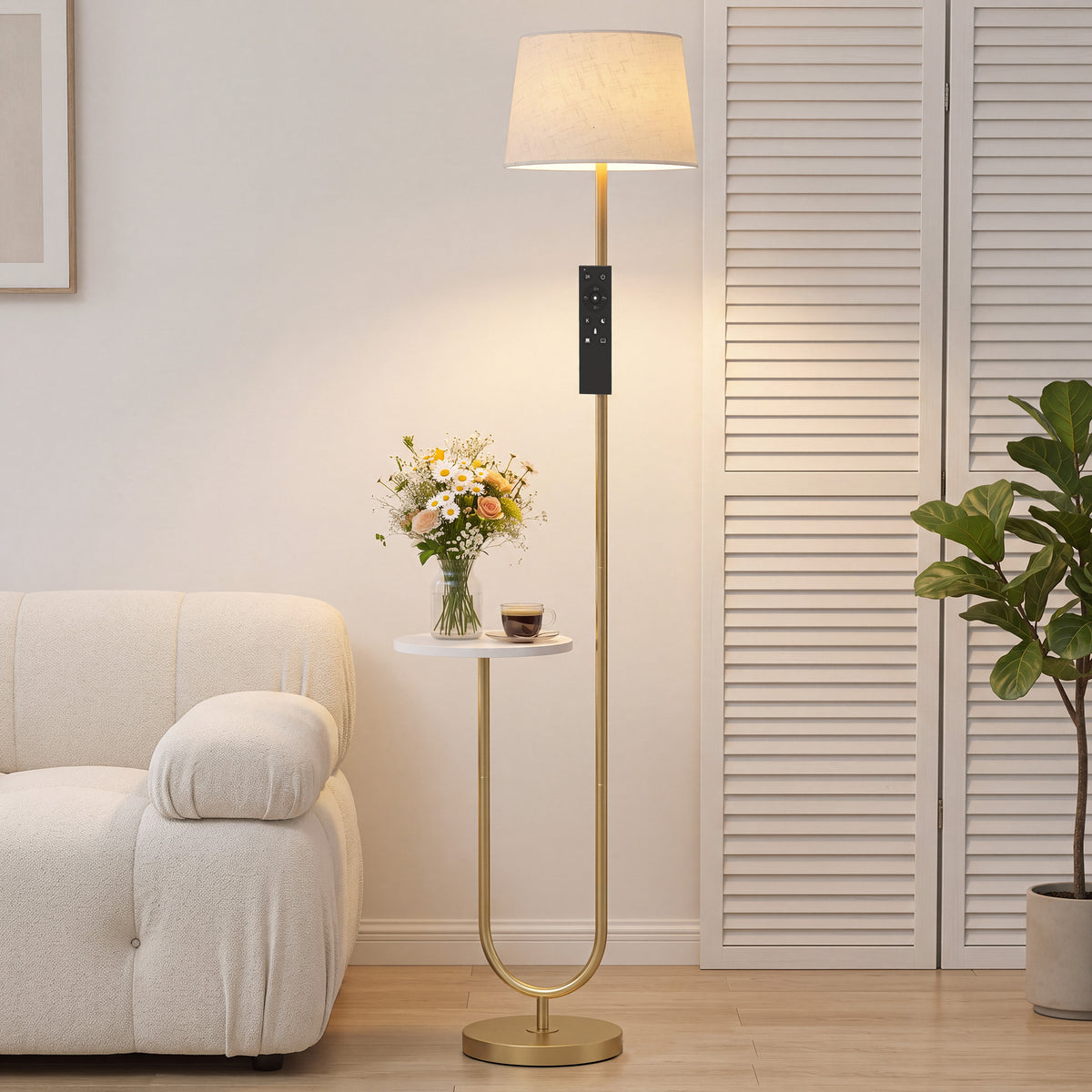Dimmable floor lamp with linen shade, brass stand, and small side shelf